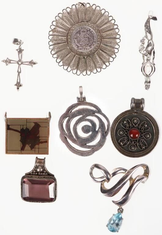 Lot 212311: VINTAGE STERLING SILVER ORNATE PENDANTS (8)