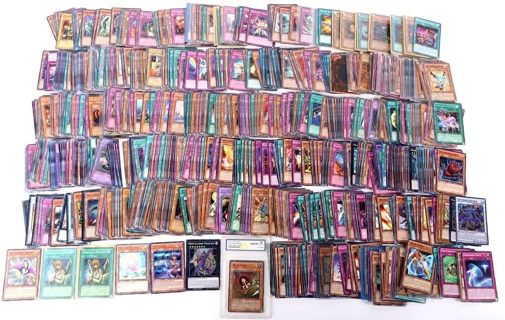 Lot 212378: YUGIOH HUGE COLLECTION OF 1996 CARDS & HOLOS