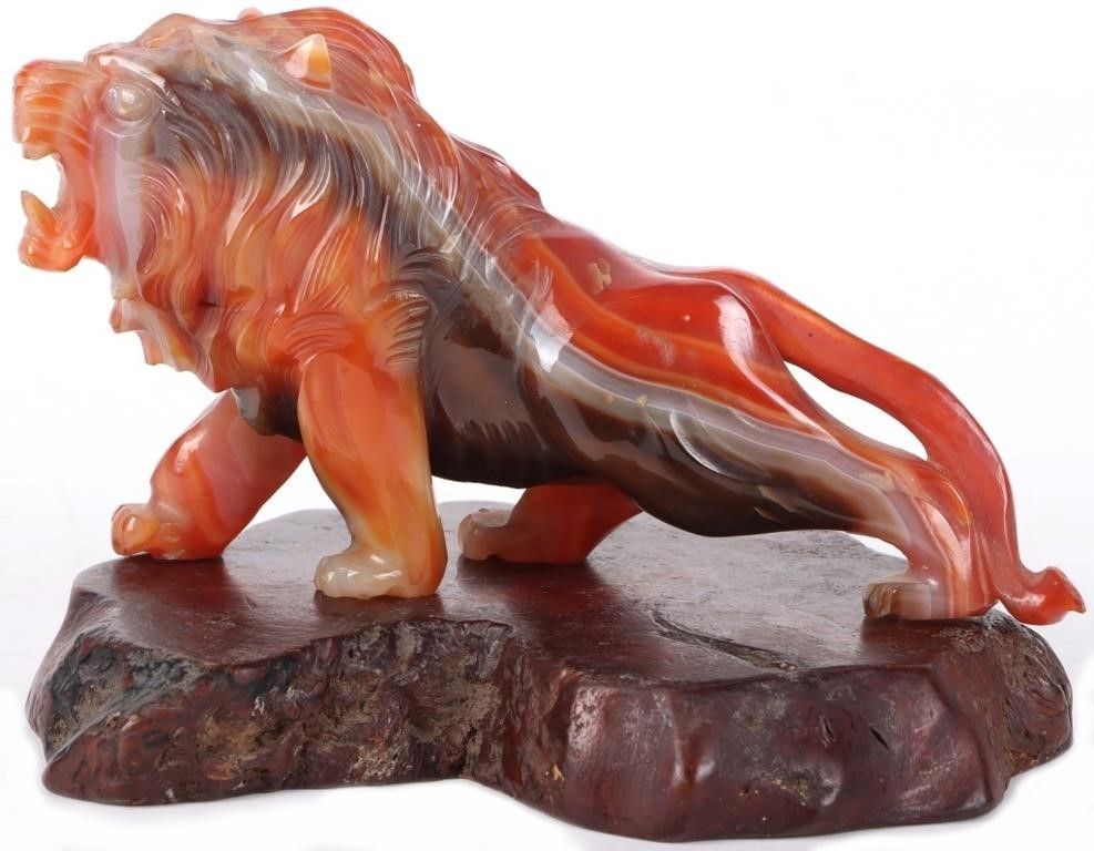 Lot 212412: VINTAGE HAND CARVED MARBLED ONYX LION FIGURINE
