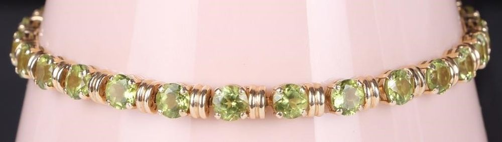 Lot 213190: 12.50CTW PERIDOT 14K YELLOW GOLD LADIES BRACELET