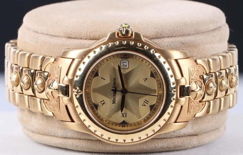 Lot 214276: MICHAEL JORDI SPIRIT OF THE WEST GOLD-TONED WATCH