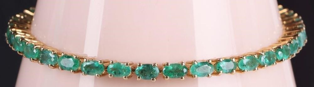 Lot 214283: ~5.25CTW EMERALD LADIES STERLING TENNIS BRACELET