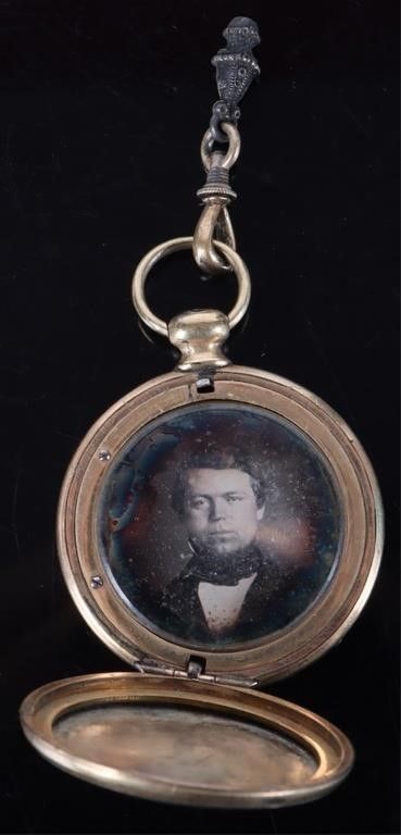 Lot 215192: 10K GOLD-FILLED ANTIQUE LOCKET W/ PICTURES & HAIR