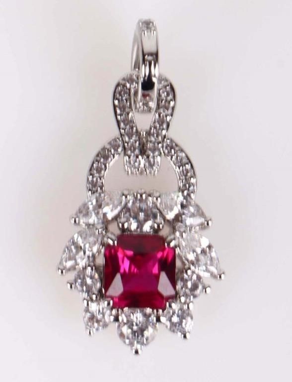 Lot 215193: LADIES PENDANT W/ 0.5CT RUBY AND WHITE STONES