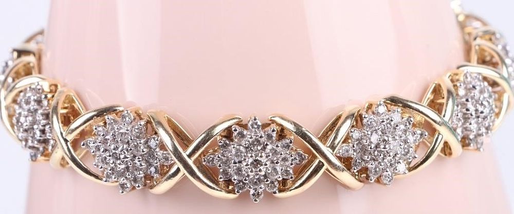 Lot 216231: 14K YELLOW GOLD "X" STYLE GOLD & DIAMOND BRACELET