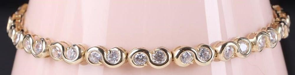 Lot 216240: 10K YELLOW GOLD CZ INFINITY LADIES BRACELET