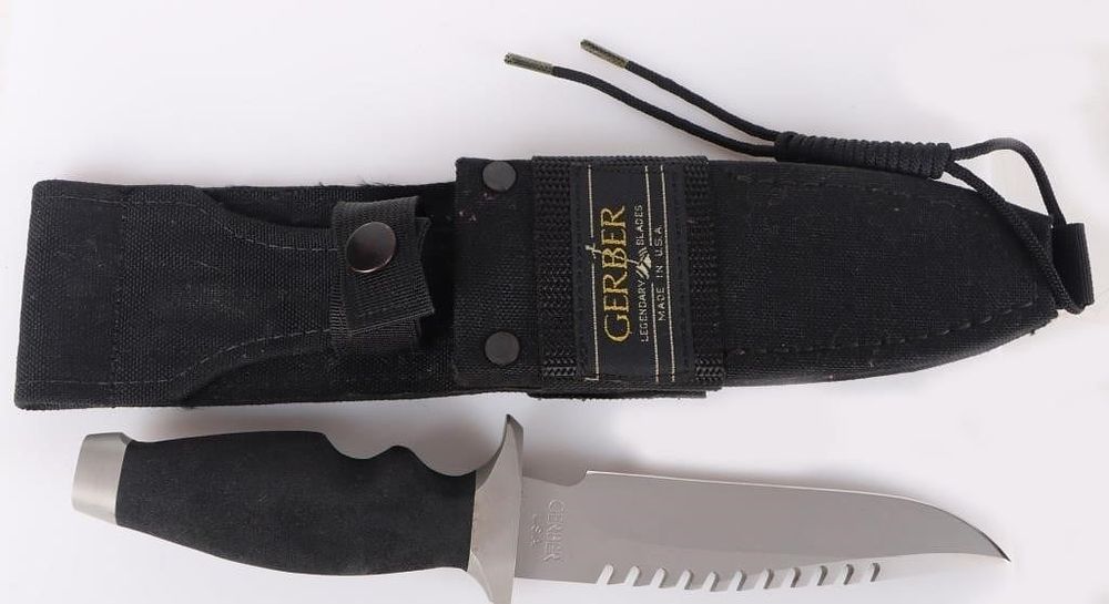Lot 216437: GERBER LMF 1ST MODEL SAWBACK TACTICAL KNIFE W/ SCA