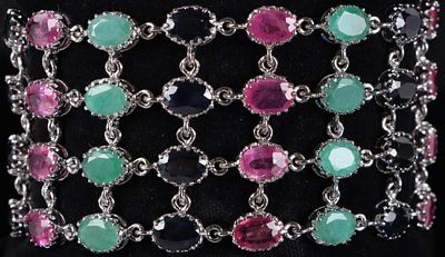 STERLING SILVER BRACELET W/ EMERALD RUBY TOPAZ. Sterling silver ladies chain bracelet with a 