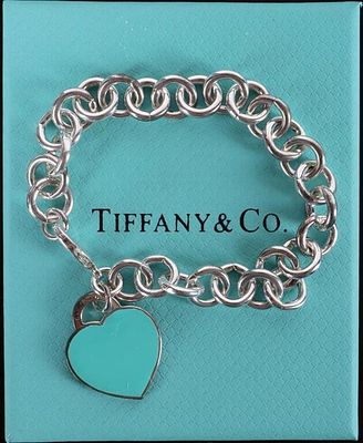 TIFFANY & CO STERLING SILVER CHARM BRACELET W/ BOX. Tiffany &amp; Co sterling silver charm 