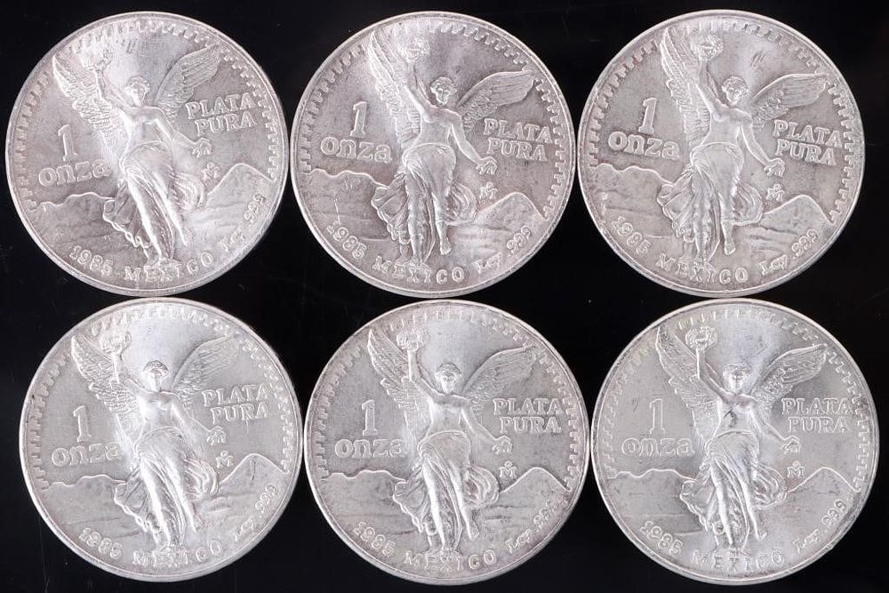 Lot 218159: FINE SILVER 1 OZT 1985 MEXICAN LIBERTAD COINS -(6)