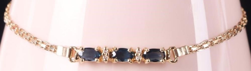 Lot 218214: 14K YELLOW GOLD LADIES BRACELET W/ DIAS & TOPAZ