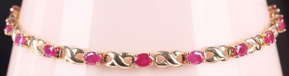 Lot 218219: 14K GOLD RUBY HUGS & KISSES LADIES TENNIS BRACELET