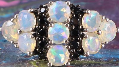 ETHIOPIAN OPAL AND BLACK ONYX LADIES CLUSTER RING. Ethiopian opal and black onyx ladies cluster 
