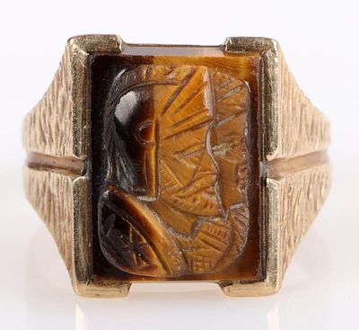 10K YELLOW GOLD CARVED TIGERS EYE MEN'S RING. 10K yellow gold carved tigers eye men's ring to 