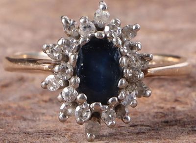 10K YELLOW GOLD LONDON TOPAZ DIAMOND LADIES RING. 10K yellow gold London blue topaz diamond 