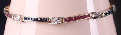10K GOLD BRACELET W/ ROSE & LONDON TOPAZ & DIAS. 10k yellow gold ladies bracelet composed of 