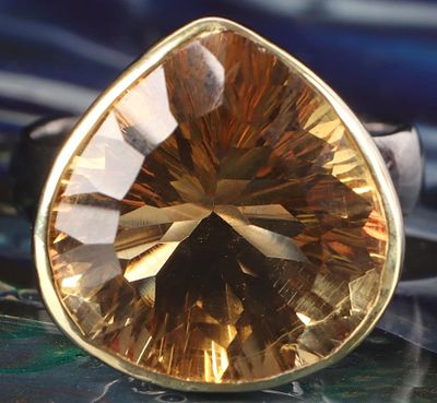 24.0CT TRILLION CITRINE STERLING SILVER RING. 18x17.5mm or 24CT trillion citrine sterling silver 