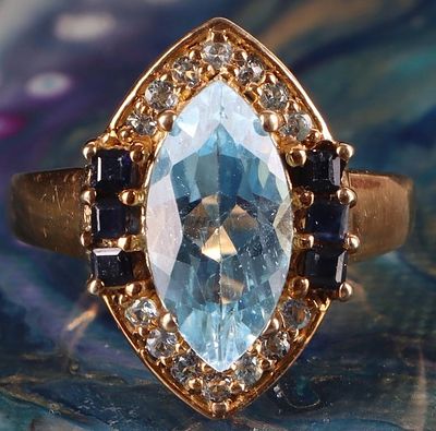 GOLD-TONE STERLING SILVER LADIES RING W/ TOPAZ. Gold-tone sterling silver ladies ring with 