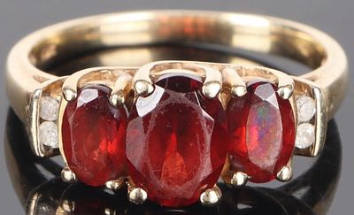 10K YELLOW GOLD DIAMOND GARNET LADIES RING. 10K yellow gold diamond garnet ladies ring. 