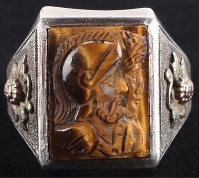 925 & 10K CARVED TIGER EYE ROMAN SOLDIER RING. Sterling silver and 10K yellow gold carved tigers 