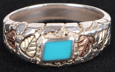 STERLING SILVER TURQUOISE LEAF LADIES RING. Sterling silver turquoise leaf ladies ring.Stone 
