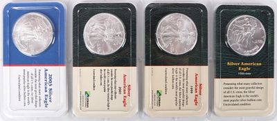 ASSORTED 1999-2003 FINE SILVER AMERICAN EAGLES(4). Assorted 1999-2003 fine silver American 