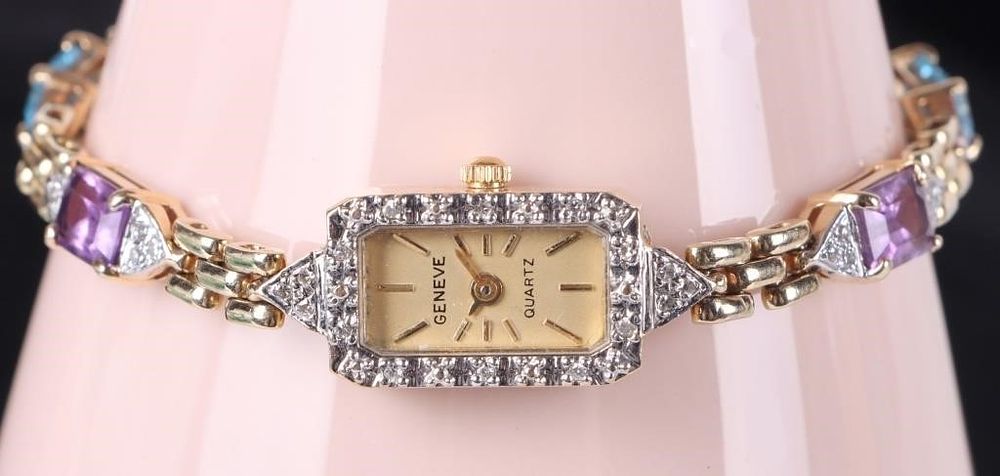 Lot 222180: GENEVE QUARTZ 14K YELLOW GOLD LADIES WATCH W TOPAZ