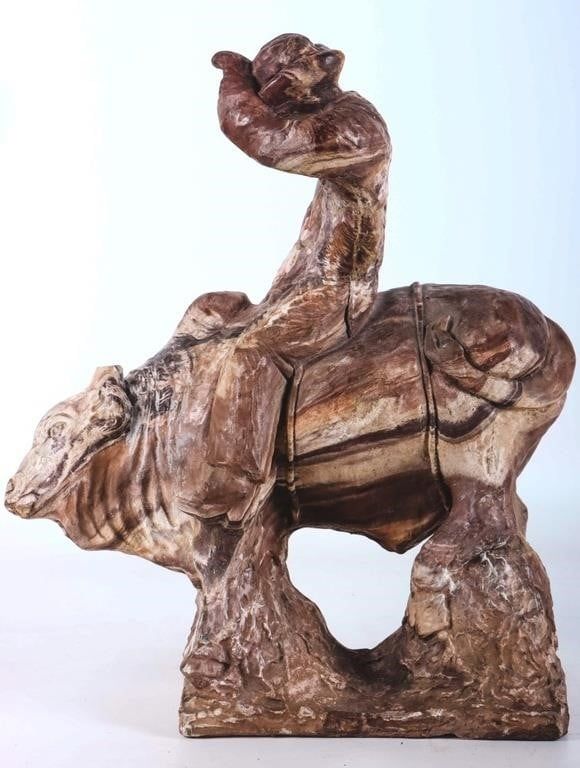 Lot 223423: SEDIMENTARY STONE CARVED COWBOY ON BULL STATUE