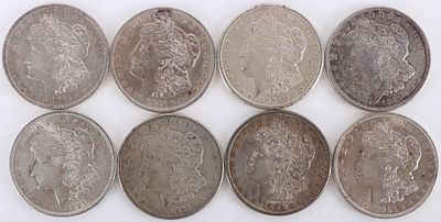 ASSORTED 90% SILVER MORGAN DOLLARS - (8). Eight assorted 90% silver Morgan Dollars.Weight: 