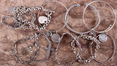 STERLING SILVER LADIES CHAIN & CHARM BRACELETS--11. Lot of eleven sterling silver ladies chain 