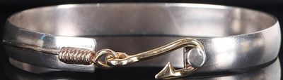 14K YELLOW GOLD ON 925 FISH HOOK LADIES BRACELET. Sterling silver ladies bracelet with a 14k 