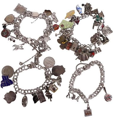 STERLING SILVER CHARM BRACELET LOT OF 4. This lot contains four sterling silver ladies charm 