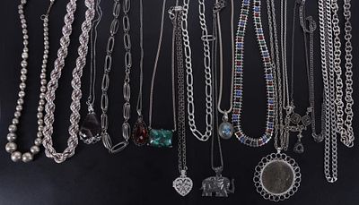STERLING SILVER ASSORTED NECKLACES LOT OF 17. This lot contains 17 assorted ladies sterling 