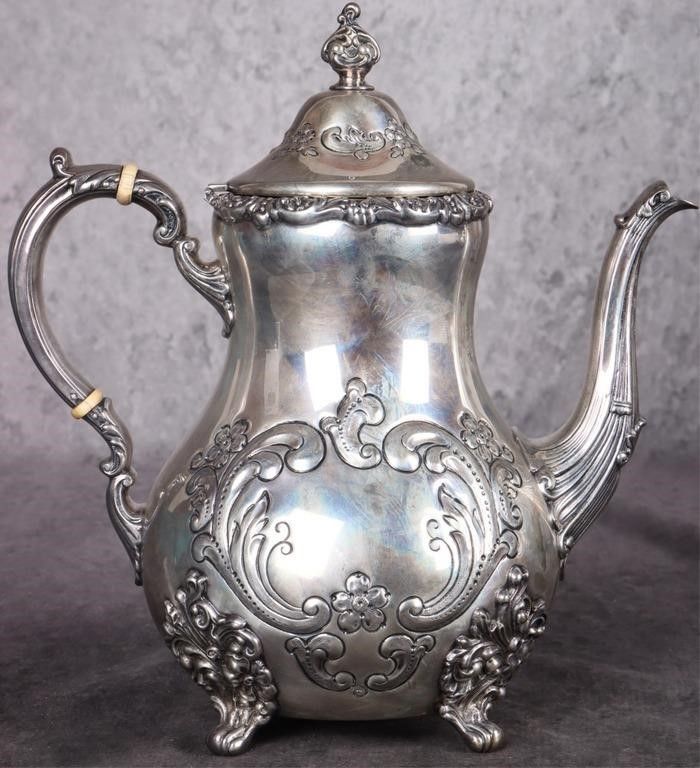 Lot 226429: POOLE STERLING SILVER OLD ENGLISH TEA POT