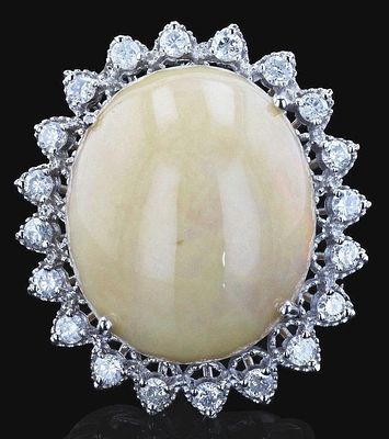 22.17CT OPAL 1.16CTW DIAMOND 14K WHITE GOLD RING. One electronically tested 14KT white gold 