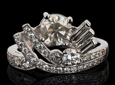 1.8 CTW DIAMONDS 44 TOTAL PLATINUM LADIES RING. One polished, stamped, and tested platinum ring 