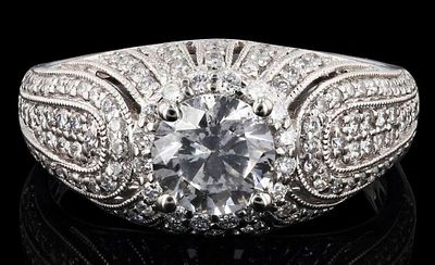 1.51 CTW DIAMOND .91CT CENTER PLATINUM LADIES RING. One polished, stamped, and tested platinum 