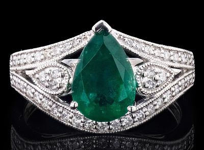2.27CT EMERALD PLATINUM LADIES RING W/ DIAMONDS. One electronically tested platinum ladies cast 