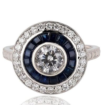 1.11CTW SAPPHIRE PLATINUM LADIES RING W/ DIAMONDS. DESCRIPTION: ONE PLATINUM LADY'S CUSTOM MADE 
