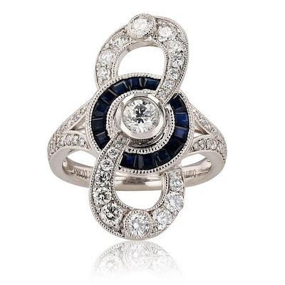 1.17CTW DIAMONDS PLATINUM LADIES RING W/ SAPPHIRE. One electronically tested platinum ladies 