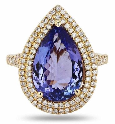 6.19CT TANZANITE & DIAMOND 14K YELLOW GOLD RING. One polished, stamped, and tested 14K yellow 