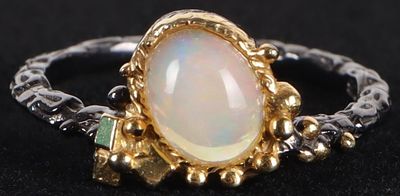 STERLING SILVER OPAL GOLD-TONED LADIES RING. Sterling silver opal gold-toned ladies ring.Stone 
