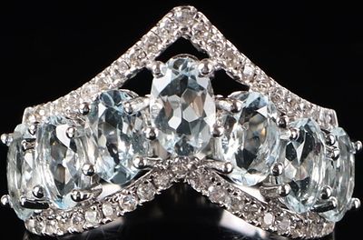 STERLING SILVER LADIES RING W/ QUARTZ & CZ. Sterling silver ladies ring with seven 0.05CT 