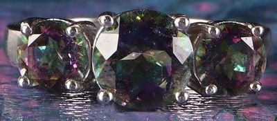 STERLING SILVER LADIES RING W/ BICOLOR SPINEL. Sterling silver ladies ring with three round-cut 