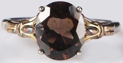 STERLING SILVER LADIES RING W/ BROWN SPINEL. Sterling silver ladies ring with a 3CT brown spinel 
