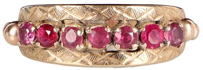 18K YELLOW GOLD LADIES RING W/ RUBIES & ETCHINGS. 18K yellow gold ladies ring with seven 0.07CT 