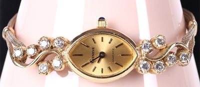 14K YELLOW GOLD DIAMOND GENEVE QUARTZ LADIES WATCH. 14K yellow gold diamond Geneve Quartz ladies 