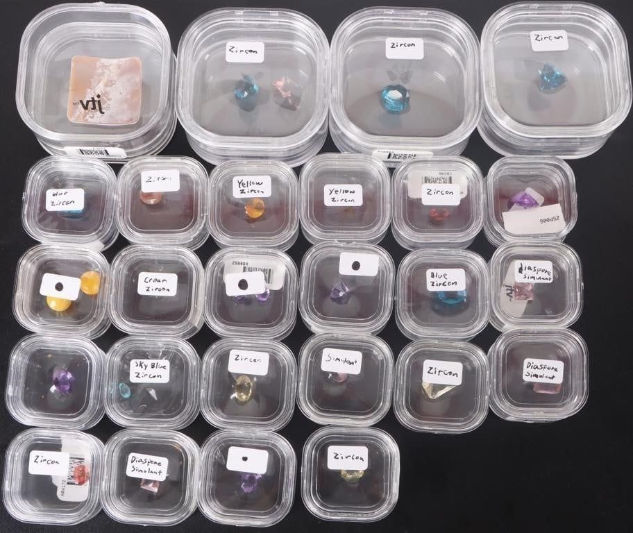 Lot 229230: ASSORTED ORNATE FACETED ZIRCON/ SIMULANTS - (26)