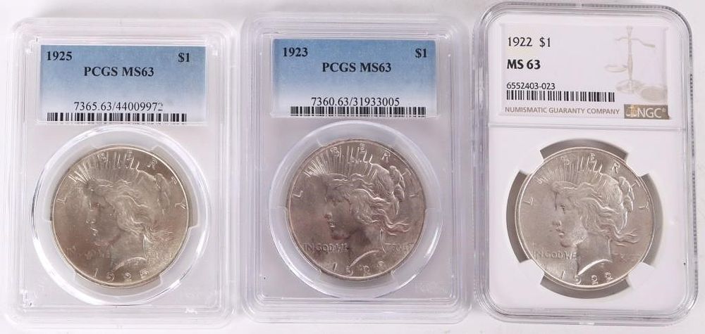 Lot 229295: ASSORTED MS-63 LIBERTY PEACE DOLLARS NGC/PCGS -(3)