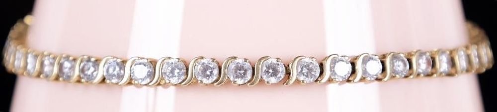 Lot 232268: 14K YELLOW GOLD LADIES BRACELET W/ RHINESTONES
